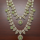 Necklace Set Detail on Polished Mahogany